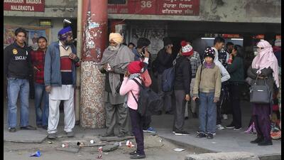 Commuters stranded at the bus strike in Ludhiana on Tuesday. (HT Photo) Commuters stranded at the bus strike in Ludhiana on Tuesday. (HT Photo)