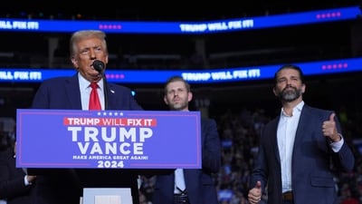 Donald Trump with sons Eric Trump and Donald Trump Jr. (AP Photo/Evan Vucci) (AP) Donald Trump with sons Eric Trump and Donald Trump Jr. (AP Photo/Evan Vucci) (AP)
