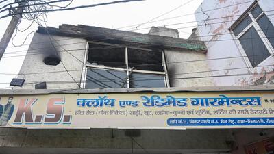Rohit managed to exit the shop from the first floor, believing that he would open the shutter lock from outside on the ground floor and rescue his wife. But when he opened the door, Vineeta had reached the first floor, where she fell unconscious, an officer said. (Sunil Ghosh/HT Photo) Rohit managed to exit the shop from the first floor, believing that he would open the shutter lock from outside on the ground floor and rescue his wife. But when he opened the door, Vineeta had reached the first floor, where she fell unconscious, an officer said. (Sunil Ghosh/HT Photo)