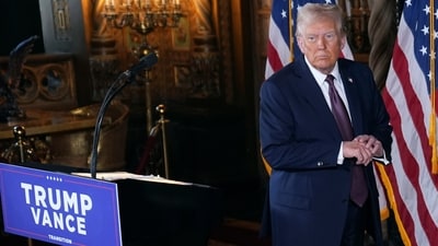 President-elect Donald Trump walks from the podium after a news conference at Mar-a-Lago, Tuesday, (AP) President-elect Donald Trump walks from the podium after a news conference at Mar-a-Lago, Tuesday, (AP)