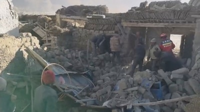 Shigaste is the traditional seat of the Panchen Lama, a key figure of Tibetan Buddhism whose spiritual authority is second only to the Dalai Lama. This picture shows rescue teams standing amid rubble in the aftermath of the earthquake. (REUTERS)