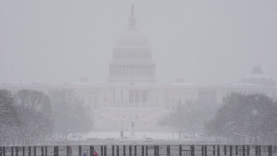 Trump inauguration: Security barriers surround the Capitol as snow falls ahead of a joint session of Congress to certify the votes from the Electoral College in the presidential election, in Washington, Monday, Jan. 6, 2025. (AP)