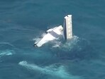 A fuselage in water off Rottnest Island, Australia, after a seaplane crashed. 