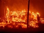 Palisades Fire: A structure burns in the Pacific Palisades neighborhood of Los Angeles, California, US, on Tuesday, Jan. 7, 2025.