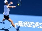 Serbia's Novak Djokovic hits a return during a training session ahead of the Australian Open tennis tournament in Melbourne.