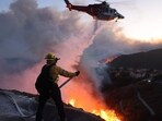 Los Angeles wildfire: The blaze further engulfed an area packed with multimillion-dollar homes in the Santa Monica Mountains. Los Angeles wildfire: The blaze further engulfed an area packed with multimillion-dollar homes in the Santa Monica Mountains.