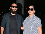 Deepika Padukone and Ranveer Singh coordinate oversized outfits in contrasting colour palettes. Deepika Padukone and Ranveer Singh coordinate oversized outfits in contrasting colour palettes.