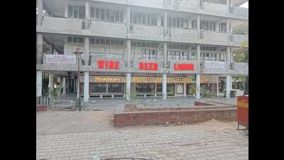 A year after it was ordered to be demolished, the structure now houses a liquor vend and a tavern, raising serious concerns about the owner’s complicity in prioritising profit over public safety. (HT Photo) A year after it was ordered to be demolished, the structure now houses a liquor vend and a tavern, raising serious concerns about the owner’s complicity in prioritising profit over public safety. (HT Photo)