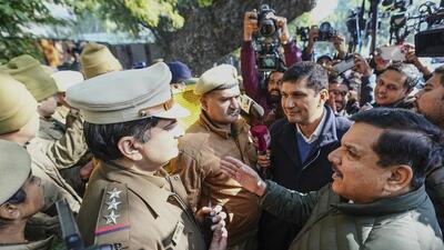 AAP leaders Sanjay Singh and Saurabh Bharadwaj were stopped from entering the chief minister's residence (PTI) AAP leaders Sanjay Singh and Saurabh Bharadwaj were stopped from entering the chief minister's residence (PTI)