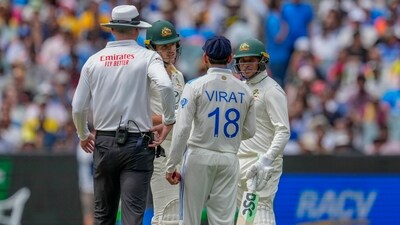 India's Virat Kohli, talks to Australia's Sam Konstas, second left, as Australia's Usman Khawaja, right, looks on during play on the first day of the fourth cricket test between Australia and India (AP) India's Virat Kohli, talks to Australia's Sam Konstas, second left, as Australia's Usman Khawaja, right, looks on during play on the first day of the fourth cricket test between Australia and India (AP)