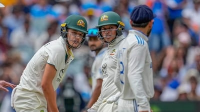India's Virat Kohli, right, talks to Australia's Sam Konstas, left, as Australia's Usman Khawaja, looks on during play on the first day of the fourth cricket Test between Australia and India at the Melbourne Cricket Ground. (AP) India's Virat Kohli, right, talks to Australia's Sam Konstas, left, as Australia's Usman Khawaja, looks on during play on the first day of the fourth cricket Test between Australia and India at the Melbourne Cricket Ground. (AP)