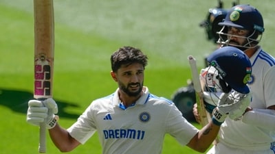 India's Nitish Kumar Reddy acknowledged the crowd as he walks off the field after losing his wicket during play on the day four of the fourth cricket test between Australia and India at the Melbourne Cricket Ground, Melbourne, Australia, Sunday, Dec. 29, 2024. (AP Photo/Asanka Brendon Ratnayake) (AP)