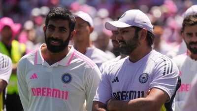 India's Jasprit Bumrah talks with teammate India's captain Rohit Sharma, right, following the fifth cricket test between India and Australia at the Sydney Cricket Ground, in Sydney, Australia, Sunday, Jan. 5, 2025. (AP Photo/Mark Baker) (AP) India's Jasprit Bumrah talks with teammate India's captain Rohit Sharma, right, following the fifth cricket test between India and Australia at the Sydney Cricket Ground, in Sydney, Australia, Sunday, Jan. 5, 2025. (AP Photo/Mark Baker) (AP)