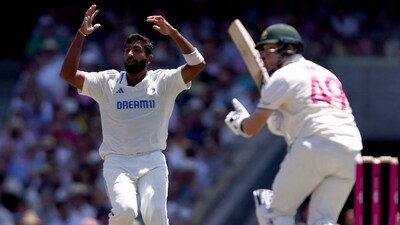 Jasprit Bumrah (L) reacts after Australia's Steve Smith hit a shot during day two of the fifth cricket Test match between Australia and India (AFP) Jasprit Bumrah (L) reacts after Australia's Steve Smith hit a shot during day two of the fifth cricket Test match between Australia and India (AFP)