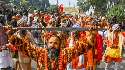 'Sadhus' of 'Shri Panch Digambar Ani Akhara', 'Shri Panch Nirmohi Ani Akhara', and 'Shri Panch Nirvani Ani Akhara' take part in the 'Chavni Pravesh', the royal entry procession for Maha Kumbh Mela 2025, (PTI) 'Sadhus' of 'Shri Panch Digambar Ani Akhara', 'Shri Panch Nirmohi Ani Akhara', and 'Shri Panch Nirvani Ani Akhara' take part in the 'Chavni Pravesh', the royal entry procession for Maha Kumbh Mela 2025, (PTI)