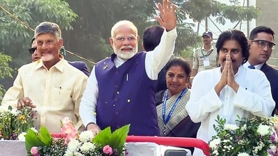 Prime Minister Narendra Modi along with Andhra Pradesh chief minister N Chandrababu Naidu and deputy CM Pawan Kalyan holds a roadshow, in Visakhapatnam on Wednesday. (ANI Grab)