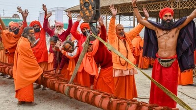 Prayagraj: 'Sadhus' take part in 'Dharm Dhwaja Puja' ceremony of Niranjani Akhara ahead of Maha Kumbh Mela 2025, in Prayagraj, Tuesday, Jan. 7, 2024. (PTI Photo)(PTI01_07_2025_000206A) (PTI) Prayagraj: 'Sadhus' take part in 'Dharm Dhwaja Puja' ceremony of Niranjani Akhara ahead of Maha Kumbh Mela 2025, in Prayagraj, Tuesday, Jan. 7, 2024. (PTI Photo)(PTI01_07_2025_000206A) (PTI)