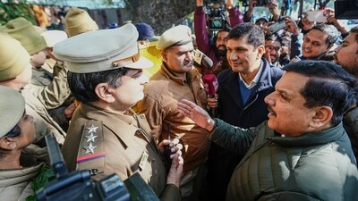 Aam Aadmi Party (AAP) leaders Sanjay Singh and Saurabh Bharadwaj outside Delhi chief minister Atishi's official residence, in New Delhi. (PTI) Aam Aadmi Party (AAP) leaders Sanjay Singh and Saurabh Bharadwaj outside Delhi chief minister Atishi's official residence, in New Delhi. (PTI)