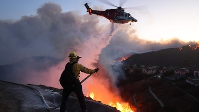 Los Angeles wildfire: The blaze further engulfed an area packed with multimillion-dollar homes in the Santa Monica Mountains. (AFP) Los Angeles wildfire: The blaze further engulfed an area packed with multimillion-dollar homes in the Santa Monica Mountains. (AFP)