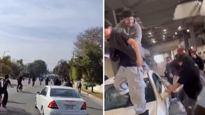 The terrifying clip shows the white car zipping past cyclists and dodging them while speeding away. (X/@NewsM101)