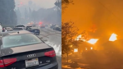 Lines of vehicles crowd the roadways as people flee on foot amid evacuation. Other videos captured numerous structures on fire. (X) Lines of vehicles crowd the roadways as people flee on foot amid evacuation. Other videos captured numerous structures on fire. (X)