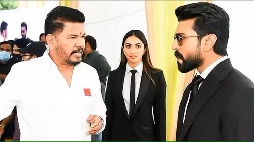 Shankar with Ram Charan and Kiara Adavni on the set of Game Changer. Shankar with Ram Charan and Kiara Adavni on the set of Game Changer.