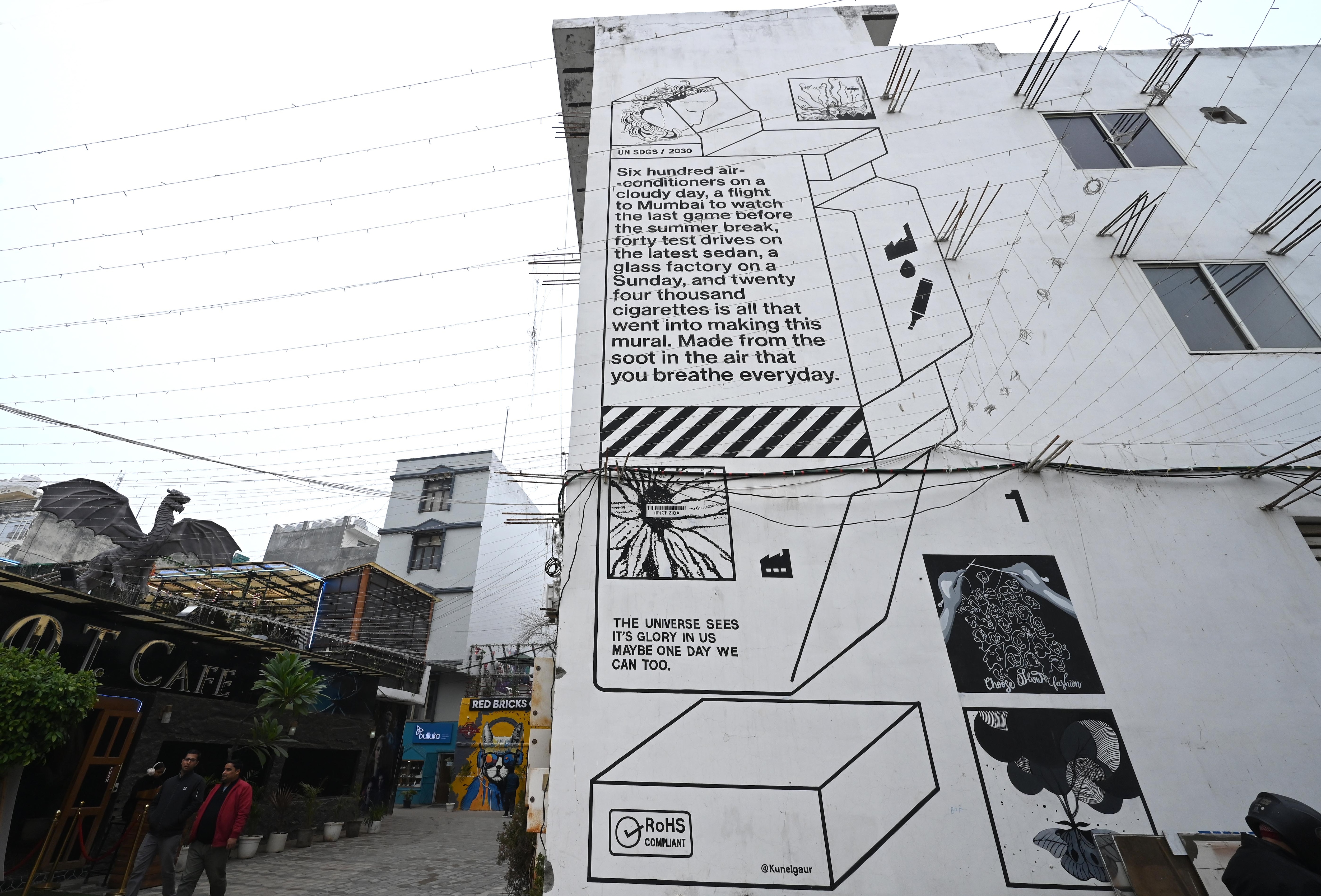 The ink used for the mural was supplied by Air Ink, an organisation that collects soot from air pollution and turns it into ink. (Arvind Yadav/ HT)