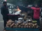 A sweet potato makeshift stall in Hazratganj A sweet potato makeshift stall in Hazratganj