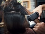 Hair rebonding and straightening can be damaging to your hair as both treatments involve using chemicals and heat to alter the hair's structure. (Freepik) Hair rebonding and straightening can be damaging to your hair as both treatments involve using chemicals and heat to alter the hair's structure. (Freepik)