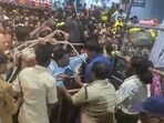 Police personnel try to control the crowd as hundreds of devotees jostle for tickets for Vaikunta Dwara Darshanam when a stampede broke out at Lord Venkateswara Swamy temple on Tirumala Hills, in Tirupati, Andhra Pradesh, Wednesday, 