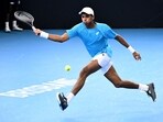 Nishesh Basavareddy of the US hits a return. Nishesh Basavareddy of the US hits a return.