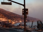 TOPSHOT - Buildings and cars destroyed by the Palisades fire lay along the Pacific Coast Highway in Malibu, California, on January 8, 2025. At least five people are now known to have died in wildfires raging around Los Angeles, with more deaths feared, law enforcement said January 8, as terrifying blazes leveled whole streets, torching cars and houses in minutes.
More than 1,000 buildings have burned in multiple wildfires that have erupted around America's second biggest city, forcing tens of thousands of people from their homes. (Photo by Zo� Meyers / AFP)