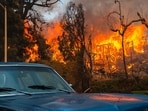 Wildfires in Los Angeles County have led to mass evacuations, destroying homes and threatening residents including celebrities. (Photo by Zo� Meyers / AFP) Wildfires in Los Angeles County have led to mass evacuations, destroying homes and threatening residents including celebrities. (Photo by Zo� Meyers / AFP)