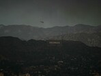 In the Hollywood Hills area alone, more than 1,000 structures, mostly homes, have been destroyed. (Photo by Patrick T. Fallon / AFP) In the Hollywood Hills area alone, more than 1,000 structures, mostly homes, have been destroyed. (Photo by Patrick T. Fallon / AFP)