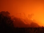 The Getty Villa art museum is threatened by the flames of the wind-driven Palisades Fire in Pacific Palisades, California.
