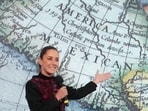 Mexico's President Claudia Sheinbaum shows a 1661 world map showing the Americas and the Gulf of Mexico in response to U.S. President-elect Donald Trump's comments about renaming the body of water, during a press conference at National Palace in Mexico City, Mexico, in this photo distributed on January 8, 2025. Presidencia de Mexico/Handout via REUTERS 