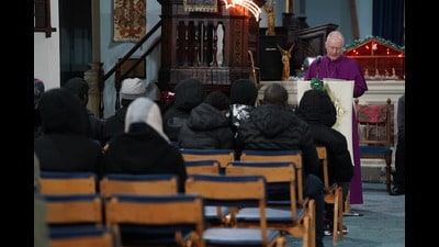 Around 40 mourners attended a vigil held at a church overlooking where Kelyan died (Lucy North/PA) Around 40 mourners attended a vigil held at a church overlooking where Kelyan died (Lucy North/PA)