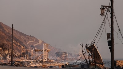 In the Malibu and Santa Monica areas, where evacuation orders were also issued, drivers abandoned cars in the face of the expanding inferno. The fire has already jumped the highway, forcing some to consider seeking refuge on the beach as flames continued to threaten the area. (REUTERS)