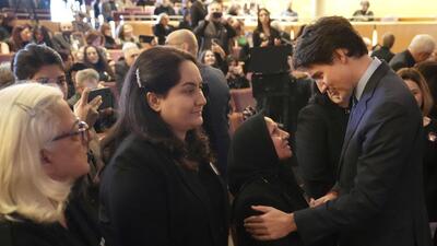 Canadian Prime Minister Justin Trudeau speaks with a bereaved family member during an event to commemorate the fifth anniversary of the downing of Ukraine International Airlines Flight 752, in Richmond Hill, Ontario, on Wednesday. (AP) Canadian Prime Minister Justin Trudeau speaks with a bereaved family member during an event to commemorate the fifth anniversary of the downing of Ukraine International Airlines Flight 752, in Richmond Hill, Ontario, on Wednesday. (AP)