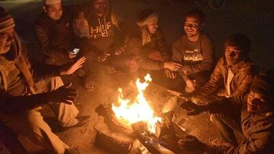 In Dasna in Neighbouring Ghaziabad, the cold winds are making wayfarers gather around bonfires to ward off the chill. Dasna nagar panchayat has set up bonfires at every intersection. (Sakib Ali/HT Photo) In Dasna in Neighbouring Ghaziabad, the cold winds are making wayfarers gather around bonfires to ward off the chill. Dasna nagar panchayat has set up bonfires at every intersection. (Sakib Ali/HT Photo)