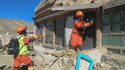 Rescuers inspect a damaged house following a powerful earthquake that struck Shigatse, southwestern China's Tibet region. (AFP) Rescuers inspect a damaged house following a powerful earthquake that struck Shigatse, southwestern China's Tibet region. (AFP)