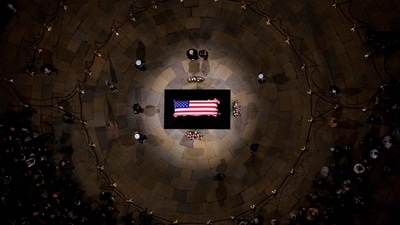 US President-elect Donald Trump and former US First Lady Melania Trump arrive to pay their respects in front of the flag-draped casket of former President Jimmy Carter at the US Capitol Rotunda in Washington, DC. (AFP) US President-elect Donald Trump and former US First Lady Melania Trump arrive to pay their respects in front of the flag-draped casket of former President Jimmy Carter at the US Capitol Rotunda in Washington, DC. (AFP)