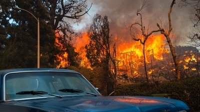 Wildfires in Los Angeles County have led to mass evacuations, destroying homes and threatening residents including celebrities. (Photo by Zo� Meyers / AFP) (AFP) Wildfires in Los Angeles County have led to mass evacuations, destroying homes and threatening residents including celebrities. (Photo by Zo� Meyers / AFP) (AFP)
