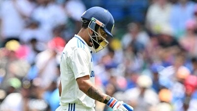 Virat Kohli walks back after his dismissal on Day 1 of Sydney Test on Friday. (AFP) (HT_PRINT) Virat Kohli walks back after his dismissal on Day 1 of Sydney Test on Friday. (AFP) (HT_PRINT)