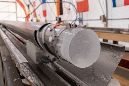 An ice core drilled by a research team is displayed at Little Dome C field base in eastern Antarctica, during the cutting phase on Tuesday, Jan. 7, 2025. (PNRA/IPEV Beyond Epica via AP) (AP)