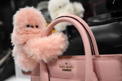 The Yukai Engineering Inc. Mirumi mascot robot that spontaneously turns it head to look at nearby people is displayed on a purse during CES Unveiled ahead of the Consumer Electronics Show (CES) in Las Vegas, Nevada on January 5, 2025 (Patrick T. Fallon/AFP) The Yukai Engineering Inc. Mirumi mascot robot that spontaneously turns it head to look at nearby people is displayed on a purse during CES Unveiled ahead of the Consumer Electronics Show (CES) in Las Vegas, Nevada on January 5, 2025 (Patrick T. Fallon/AFP)