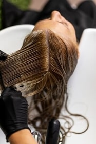 Hair straightening involves using heat styling tools or chemicals to relax curls and achieve a straighter hair texture. (Freepik) Hair straightening involves using heat styling tools or chemicals to relax curls and achieve a straighter hair texture. (Freepik)