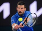 Serbia's Novak Djokovic plays a backhand return to Germany's Alexander Zverev during an exhibition match ahead of the Australian Open tennis championship in Melbourne, Australia, Thursday, Jan. 9, 2025. (AP Photo/Vincent Thian) Serbia's Novak Djokovic plays a backhand return to Germany's Alexander Zverev during an exhibition match ahead of the Australian Open tennis championship in Melbourne, Australia, Thursday, Jan. 9, 2025. (AP Photo/Vincent Thian)