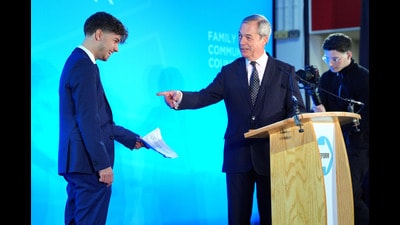 Former councillor Harrison Allman-Varty joins Reform UK leader Nigel Farage onstage as he announces he is defecting from the Conservative party to join Reform UK (Jonathan Brady/PA) Former councillor Harrison Allman-Varty joins Reform UK leader Nigel Farage onstage as he announces he is defecting from the Conservative party to join Reform UK (Jonathan Brady/PA)