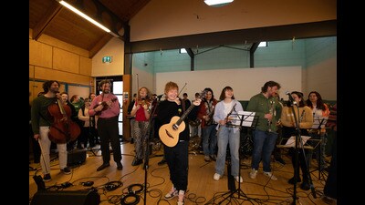 Ed Sheeran pictured with youngsters involved in the Tinderbox Collective, an initiative that aims to foster and grow young musicians’ talent (Mark Surridge/PA) Ed Sheeran pictured with youngsters involved in the Tinderbox Collective, an initiative that aims to foster and grow young musicians’ talent (Mark Surridge/PA)